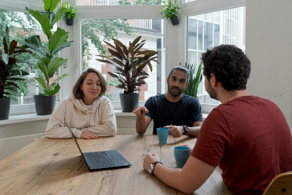 Coworkers Discussing - Transfer Ownership Of Google Calendar