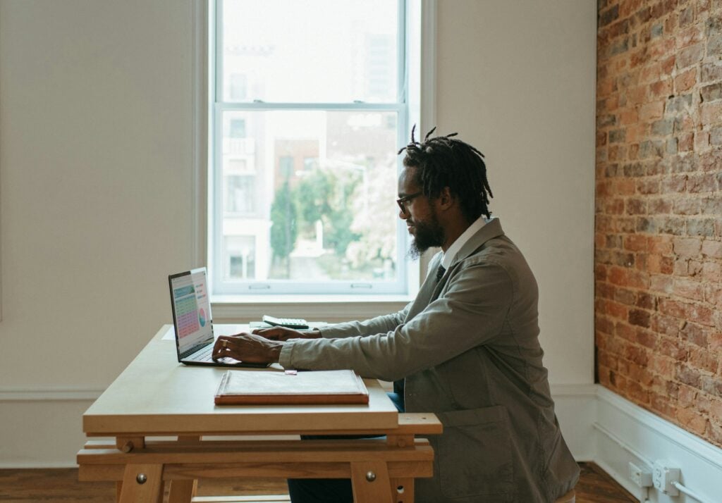 Man Using Laptop - Transfer Ownership Of Google Calendar