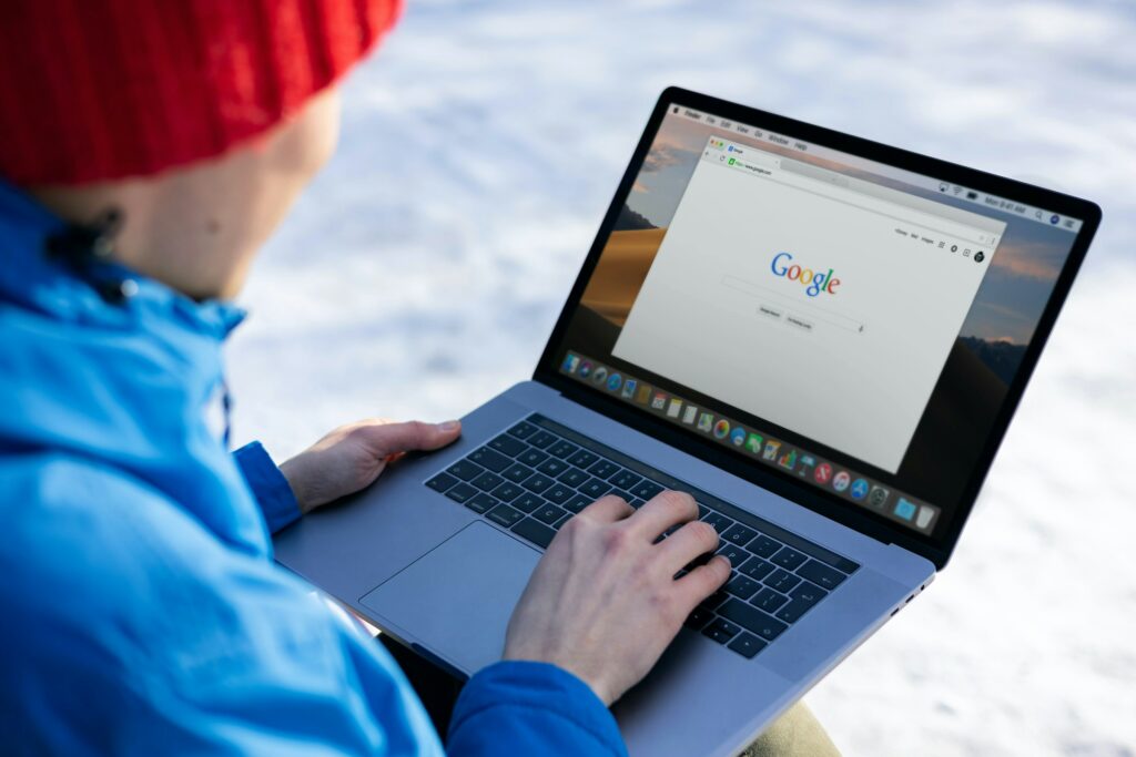 Person Working on Laptop - Share google tasks