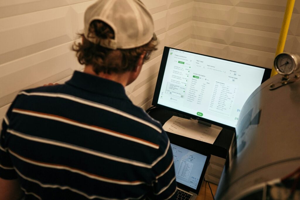 person on laptop - Your ultimate guide to Timeboxing templates