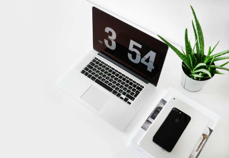 laptop on a table - Toggl Alternatives