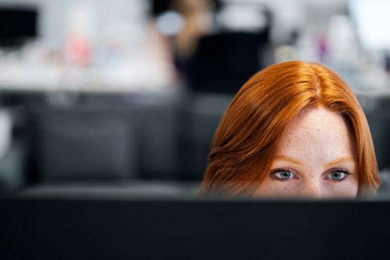 woman on computer - Automated Timesheets