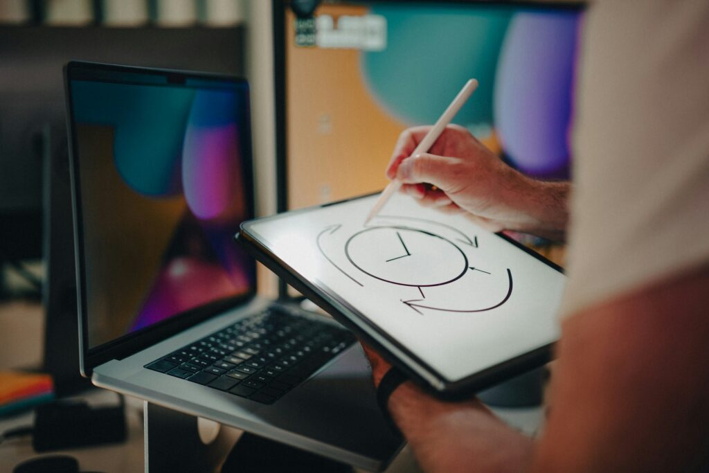 man drawing a clock - ActivTrak Alternatives