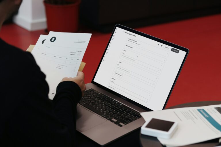 person sorting through invoices - Invoice for Hours Worked