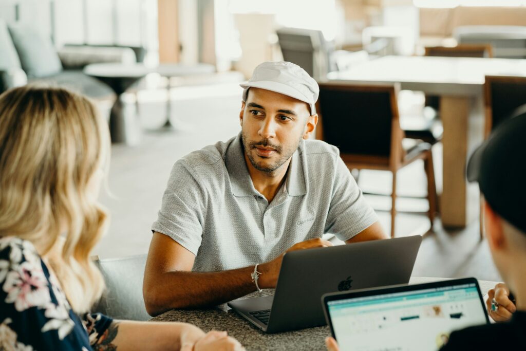 man with people - QuickBooks Alternatives