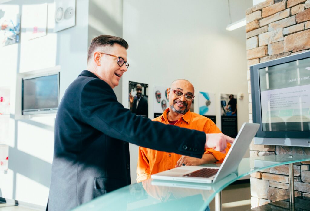 man with a laptop - Accelo Alternatives