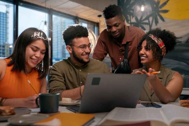 employees in a meeting - Microsoft Project vs Trello