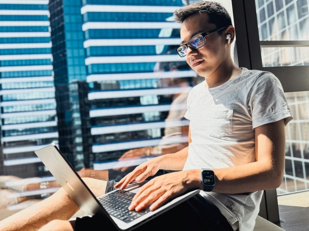 Man Using Laptop - Client Project Management