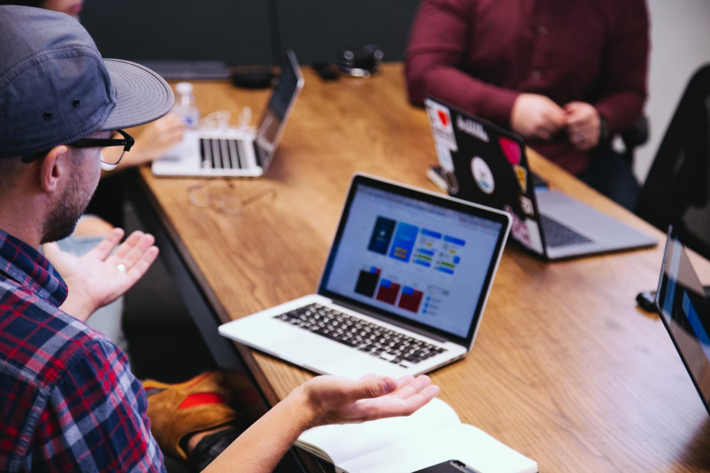 man using a laptop - Creative Agency Resource Management