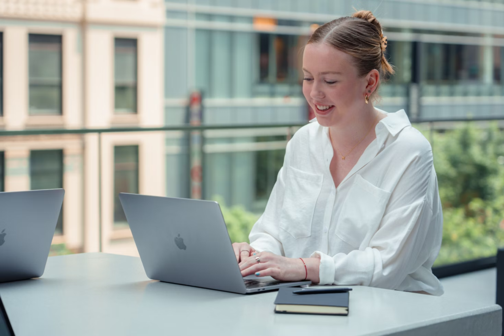 woman typing - Project Time Management