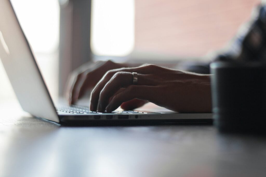 Person Using Laptop - Time Tracking Best Practices