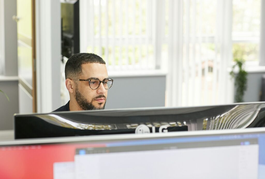 Man Working - Freshbooks vs Quickbooks
