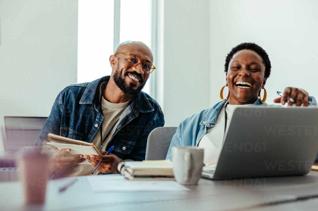 employees laughing - Friday Memes for Work