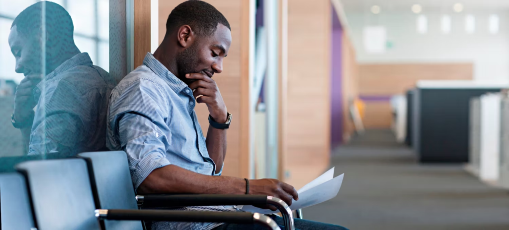 mman sitting on a seat - Leadership Interview Questions