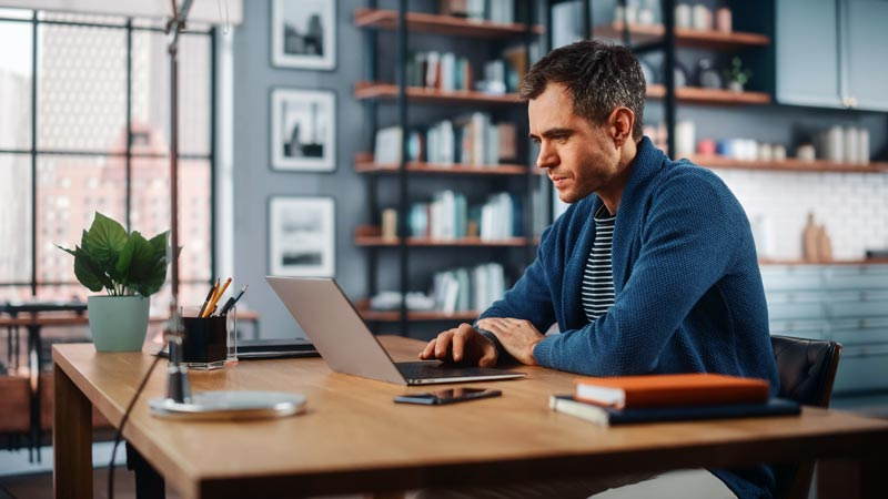 man using a calendar - How Many Weekend Days in a Year