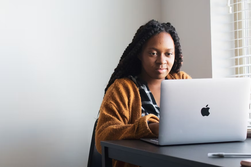 woman using a laptop - Cute Friday Memes
