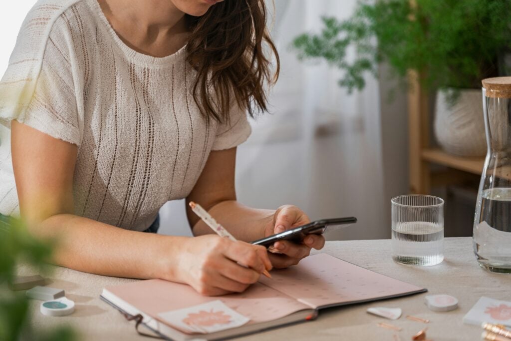 Person Using phone - Best Free Habit Tracker App