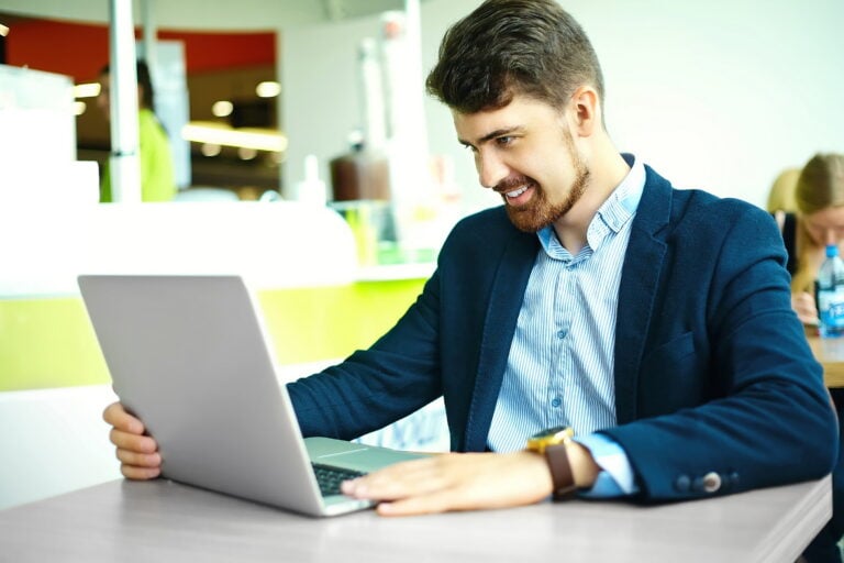 employee using a laptop - Submit Your Timesheet Meme