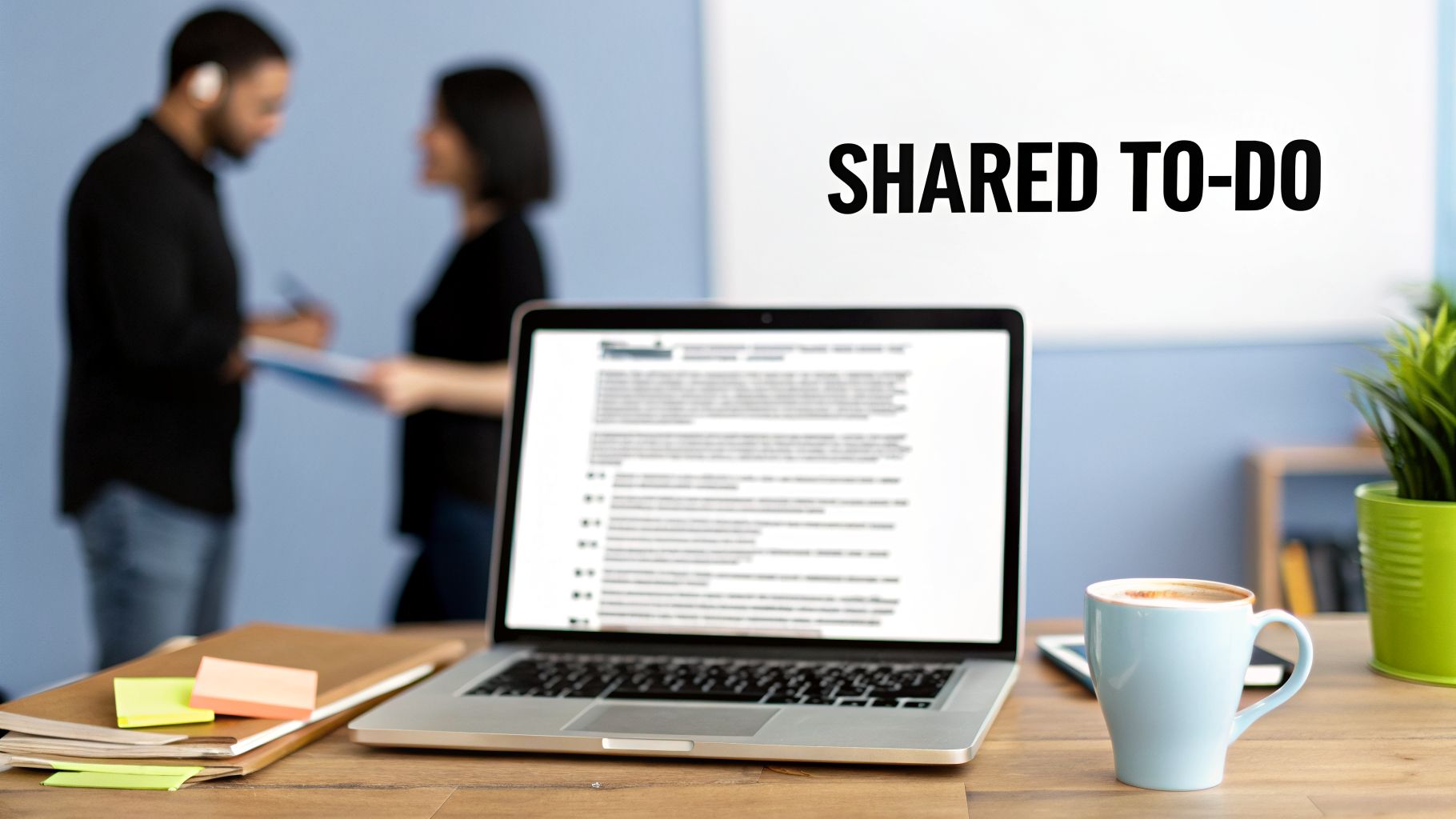 Office desk with laptop, coffee, and sticky notes, highlighting a 'SHARED TO-DO' whiteboard.