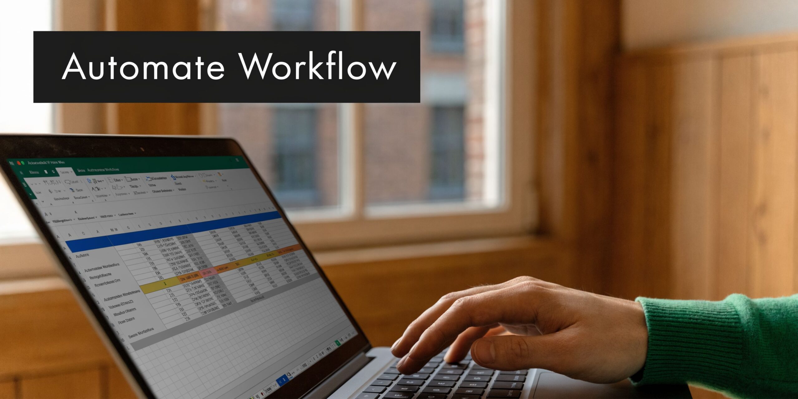A person using a laptop to automate their workflow by managing business data in an Excel spreadsheet.