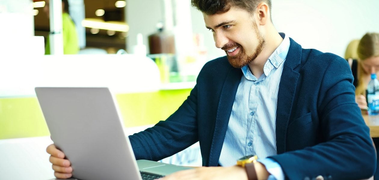 employee using a laptop - Submit Your Timesheet Meme